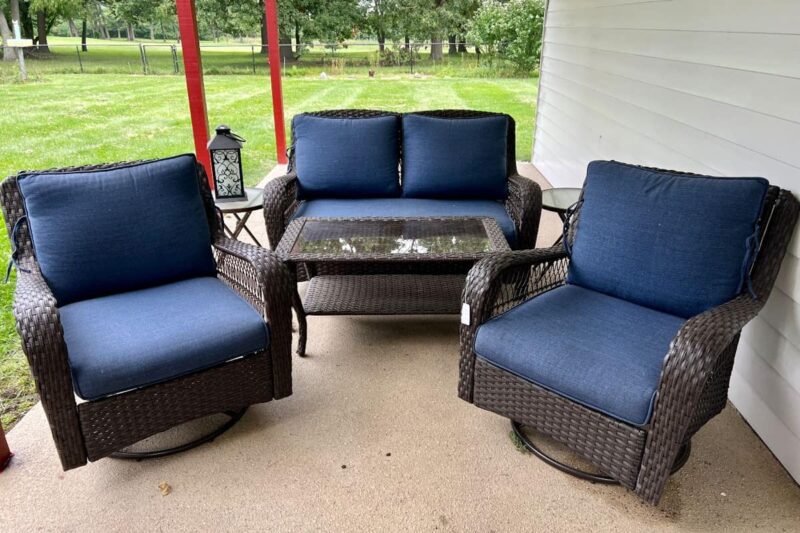 6 piece outdoor patio furniture set with dark whicker and blue cushions