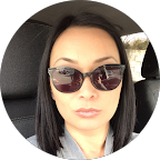 stylish woman with sunglasses and shoulder length straight hair